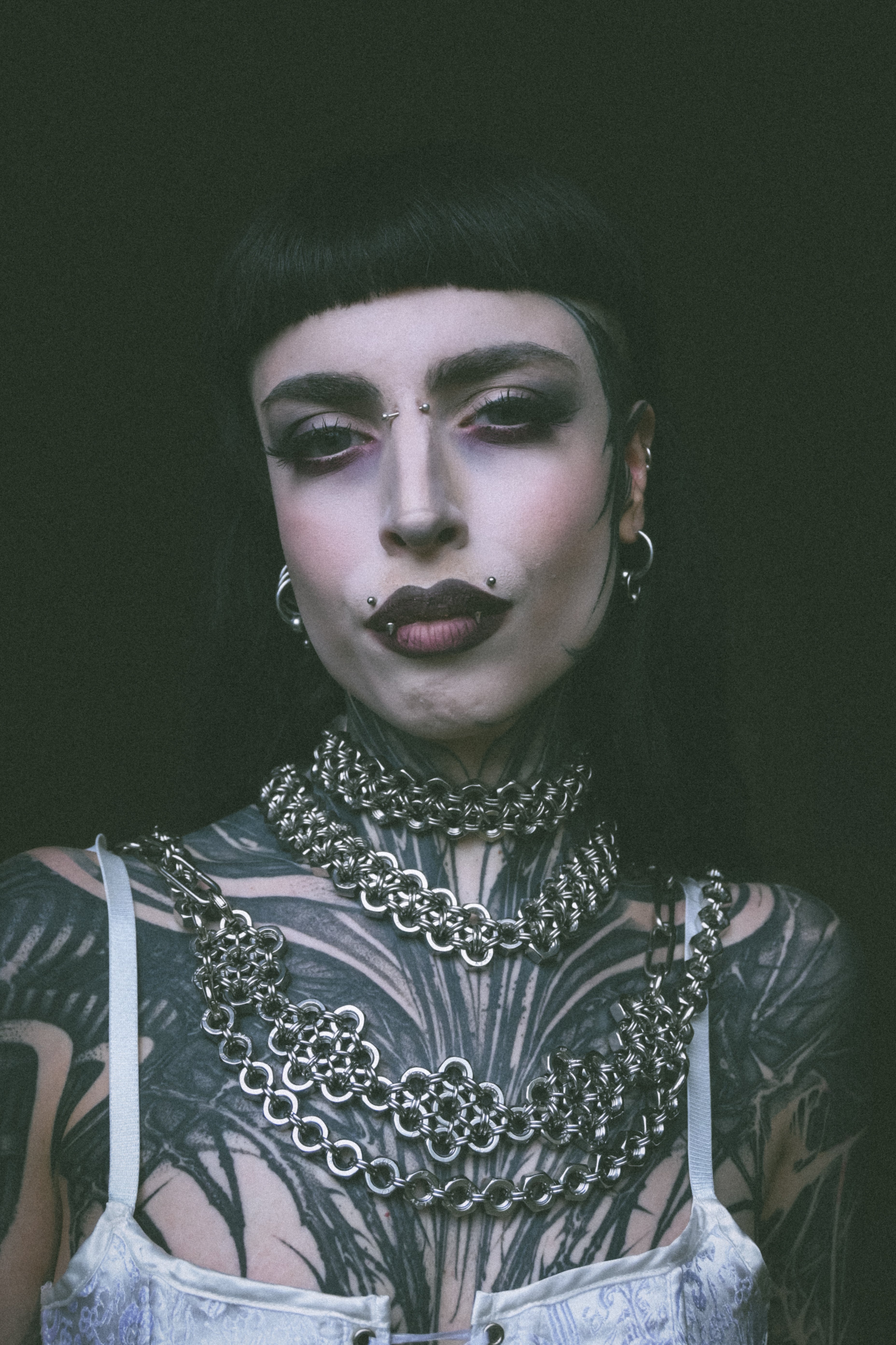 alternative model is wearing chainmail jewellery made from stainless steel screws and chainmails industrial fashion techno fashion